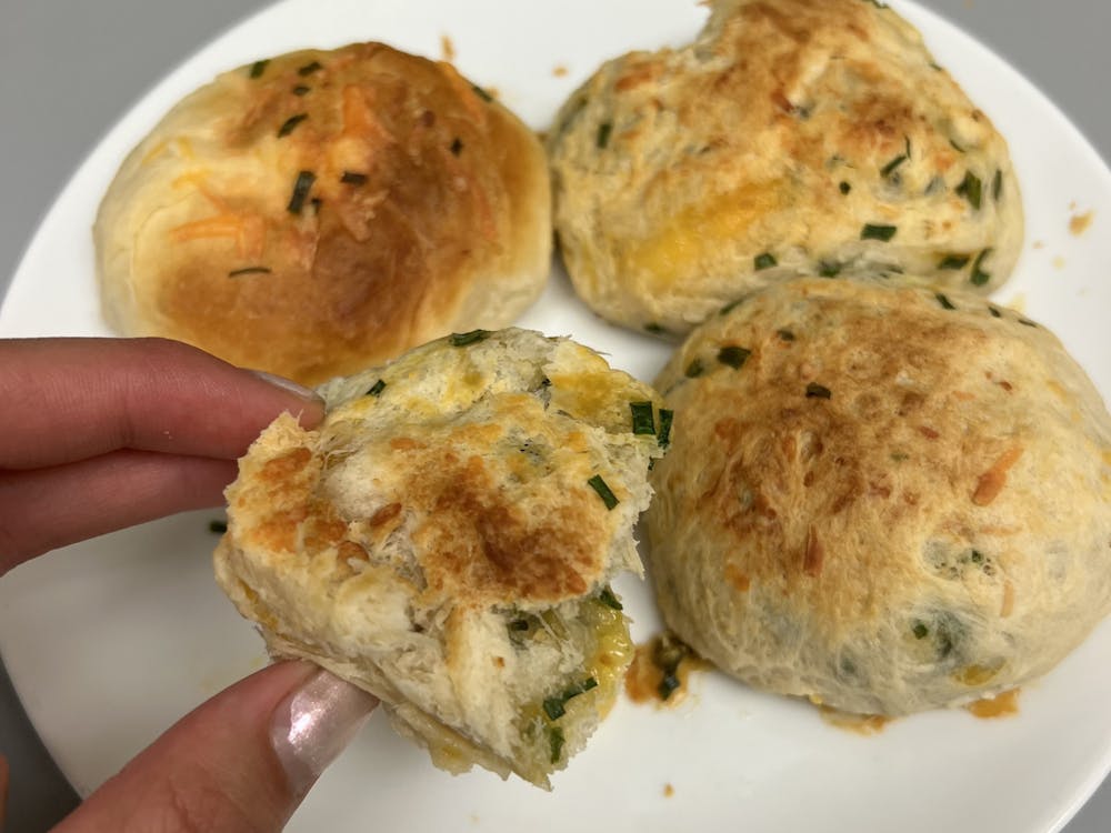 COURTESY OF KAYLA RABEY
Rabey walks through her recipe for cheesy chive biscuits, a family favorite that brings her joy while she's away.