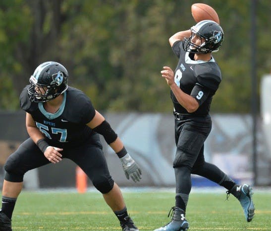 HOPKINSSPORTS.COM
Jonathan Germano threw for 443 yards and six TDs.