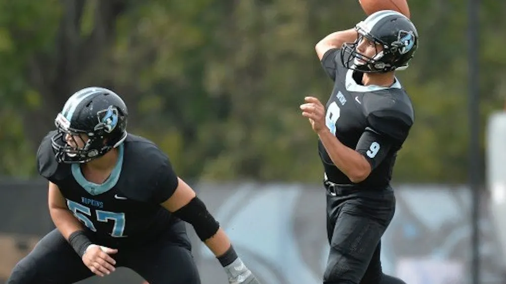 HOPKINSSPORTS.COM
Jonathan Germano threw for 443 yards and six TDs.