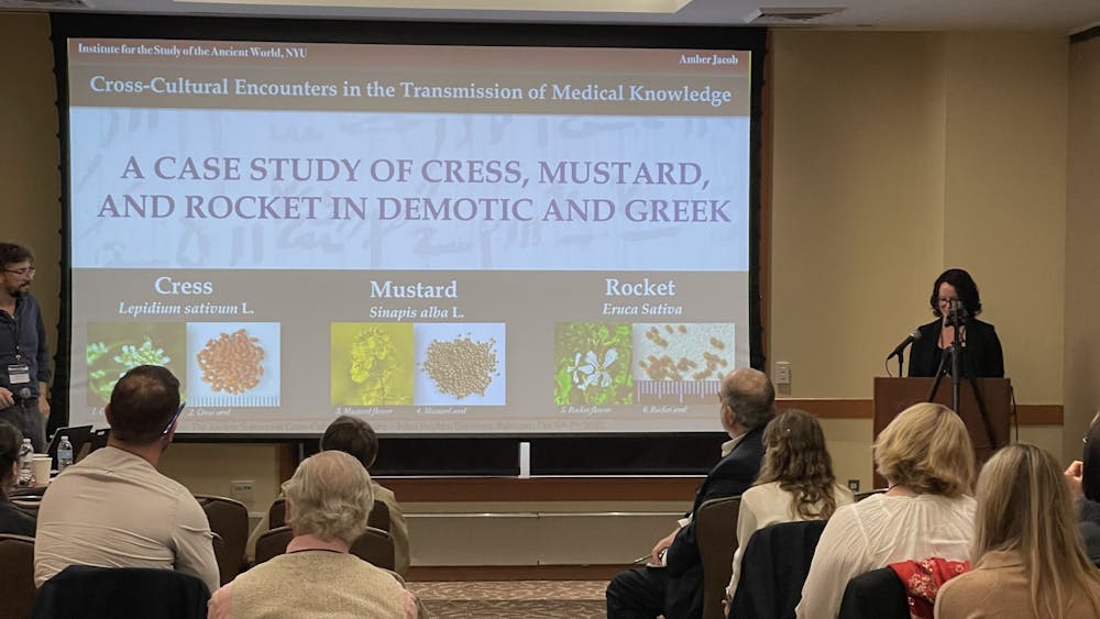 COURTESY OF ZACHARY BAHAR.
Amber Jacobs discusses a treatment involving cress, mustard and rocket found in Greek, Roman and Egyptian sources at the Prescription to Prediction conference.