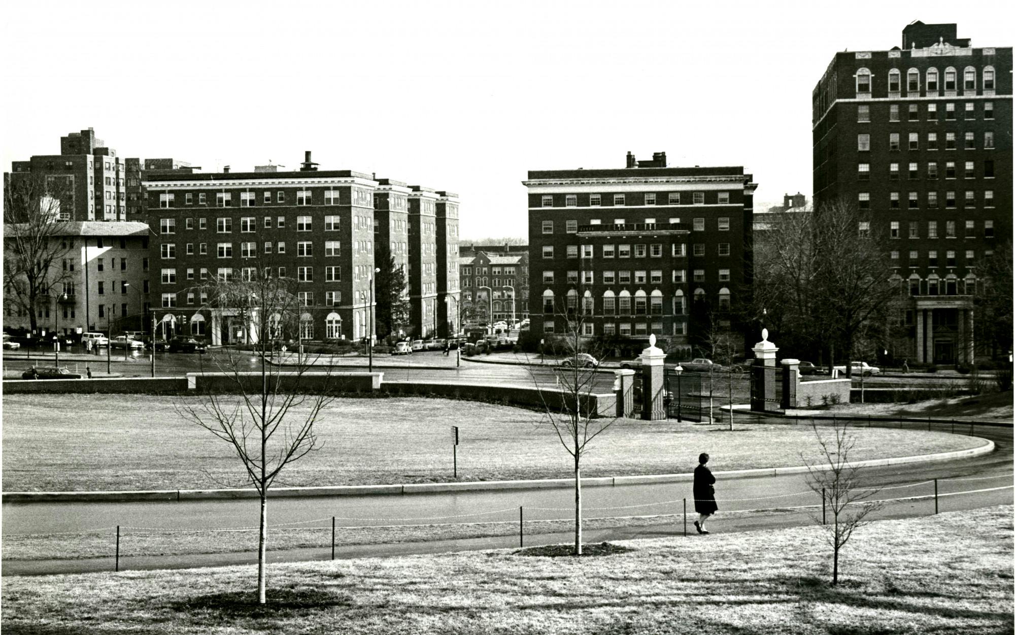 COURTESY OF THE JOHNS HOPKINS UNIVERSITY GRAPHIC AND PICTORIAL COLLECTION
A woman walks past the Beach in 1966, around Korn's time at Hopkins.