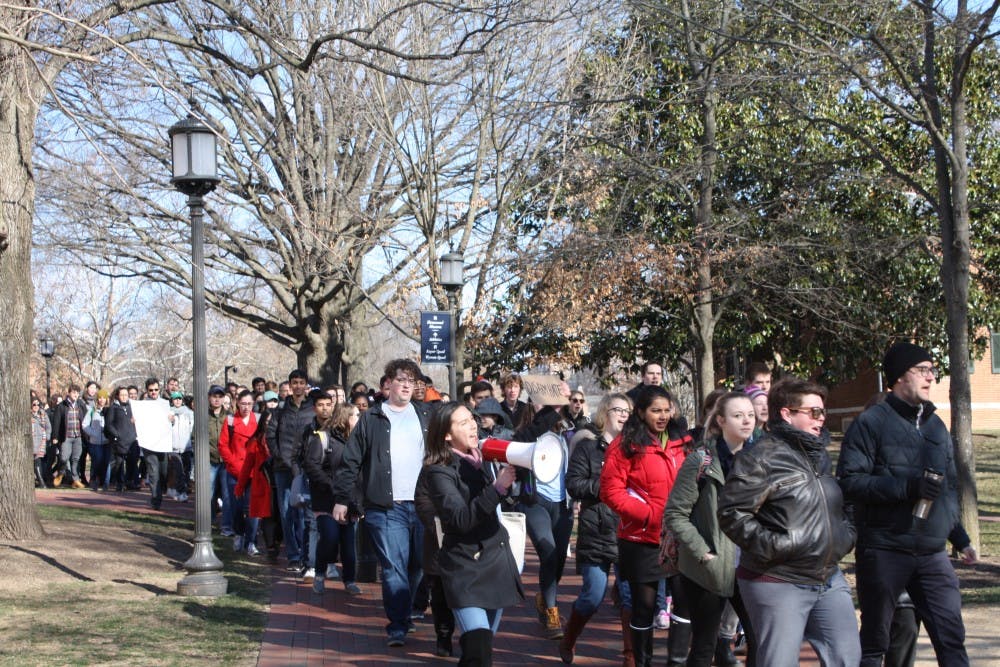 COURTESY OF ROLLIN HU
Alongside national school walkouts, Hopkins students gathered on Keyser Quad and marched to the Beach, calling for stricter gun control measures.