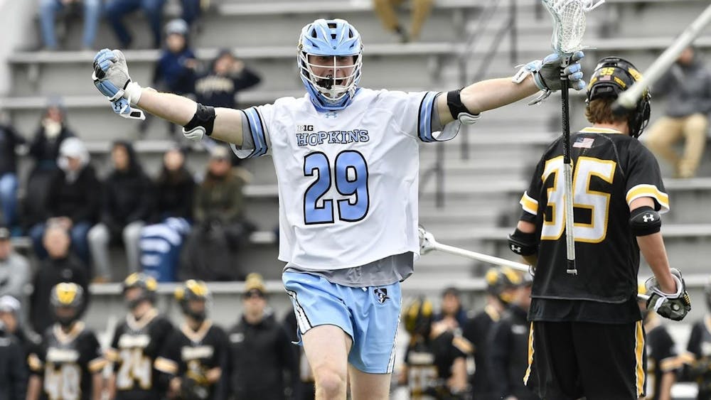 HOPKINSSPORTS.COM
Evan Zinn scored two goals and added an assist in the Jays’ 15-7 win.
