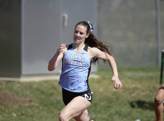 Hopkinssports.com
McDonald races to a 58.25-second finish for a meet record in the 400 meter.