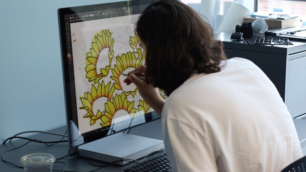 COURTESY OF THE DIGITAL MEDIA CENTER
A student works with the DMC’s Microsoft Surface Studio.