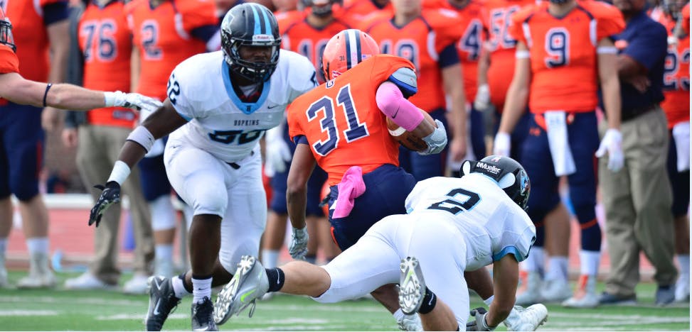 HOPKINSSPORTS.COM
Keonte Henson and Garrett Spek both helped shut down the Bullets.