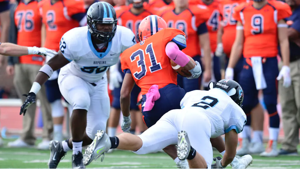 HOPKINSSPORTS.COM
Keonte Henson and Garrett Spek both helped shut down the Bullets.