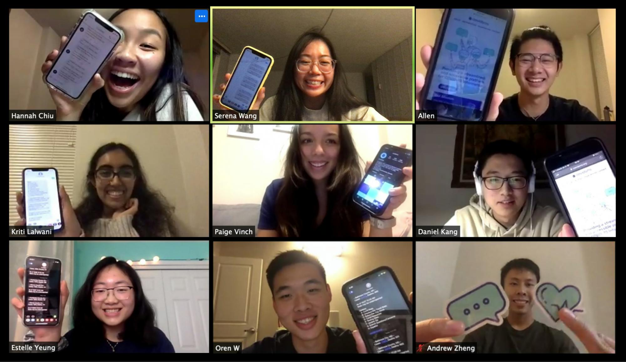 COURTESY OF COVIDSMS
The COVIDSMS team pose with phones displaying messages from the texting service.