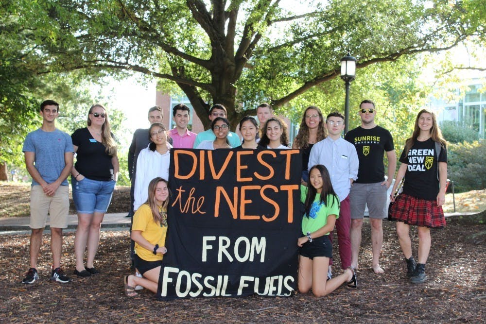 NEHA SANGANA/PHOTOGRAPHY EDITOR
Members of Refuel Our Future at their first DivestFest event in September 2019.