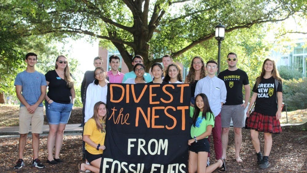 NEHA SANGANA/PHOTOGRAPHY EDITOR
Members of Refuel Our Future at their first DivestFest event in September 2019.