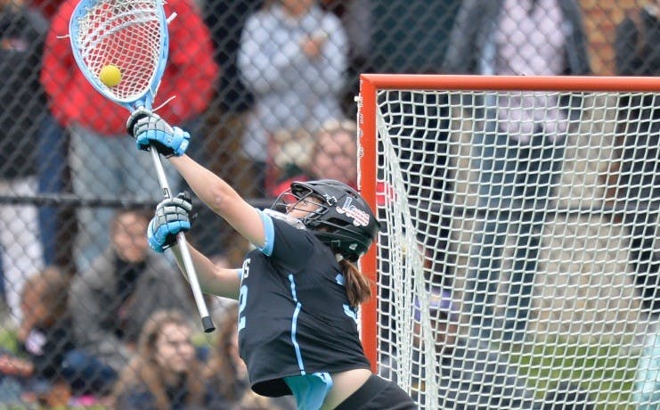 HOPKINSSPORTS.COM
Senior Caroline Federico stopped 15 shots against Georgetown.