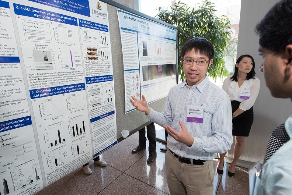 COURTESY OF PRESTON GE
Ge presents a poster about his research on misfolded Alzheimer protein for the PURA poster session.