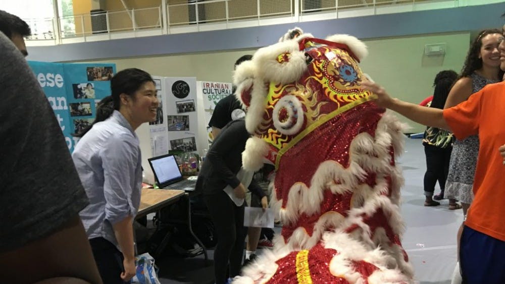  COURTESY OF JULIE CUI
Groups such as the Yong Han Lion Dance club reached out to interested students in every corner of the fair.
