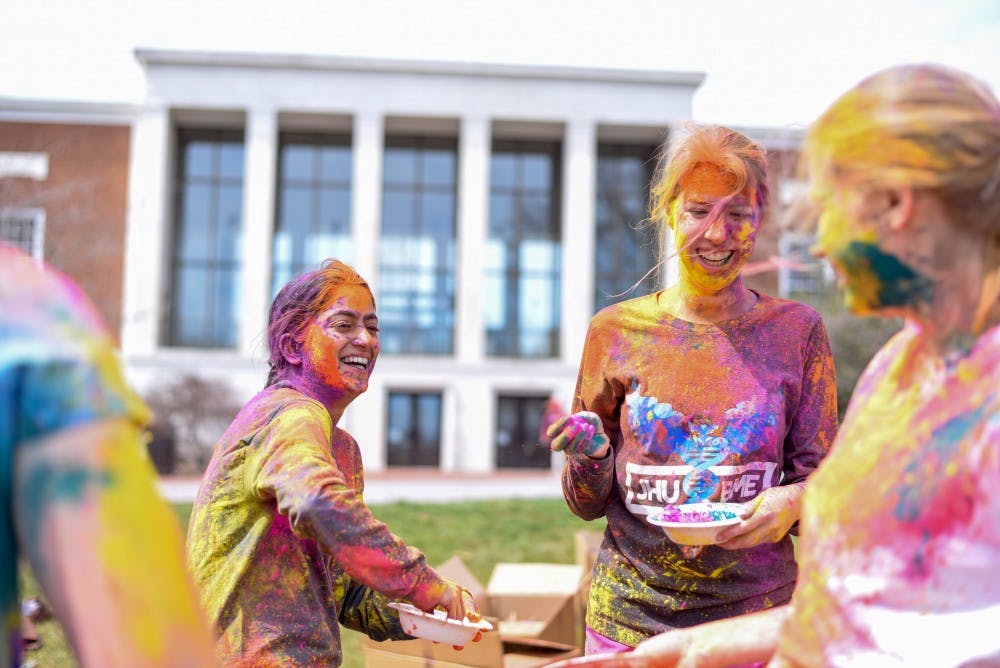 Courtesy Naina Rao
Students threw colored powder at each another on the Beach last Sunday as part of Holi.