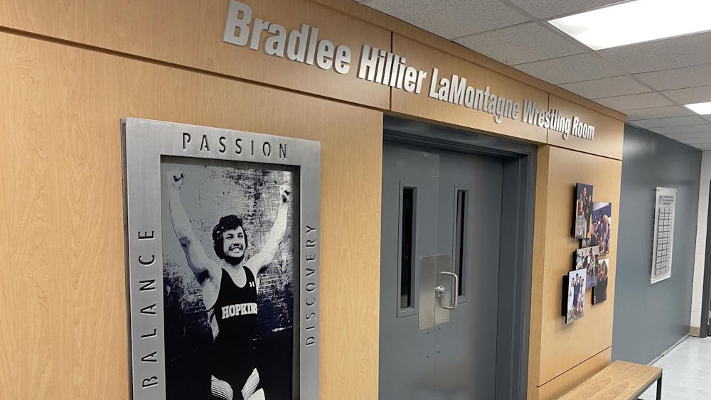 COURTESY OF HOPKINSSPORTS.COM
As part of the night’s events, the renovated Bradlee Hillier LaMontagne room was unveiled.