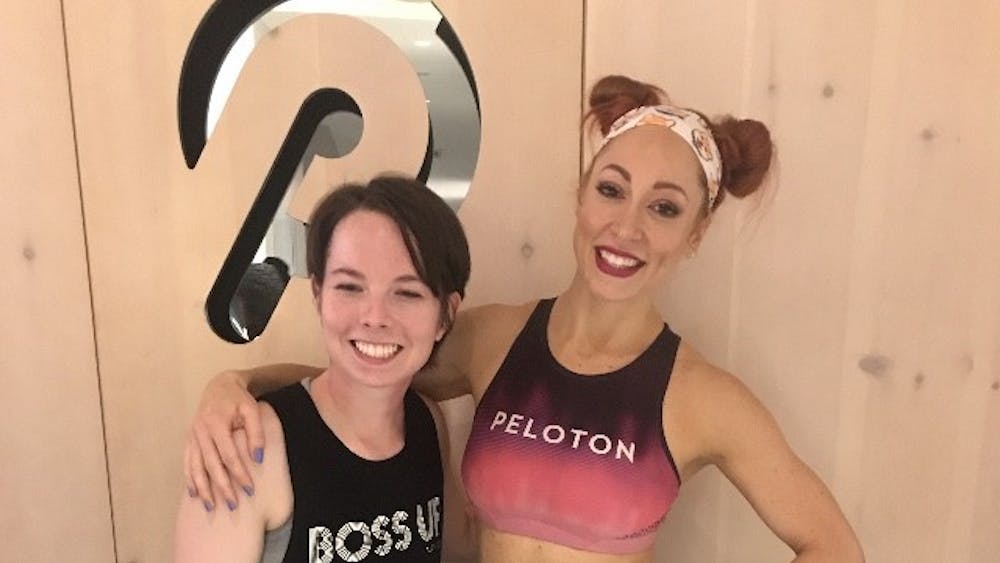 COURTESY OF KATHERINE LOGAN
Logan with Peloton instructor Jess King at the studios in New York.