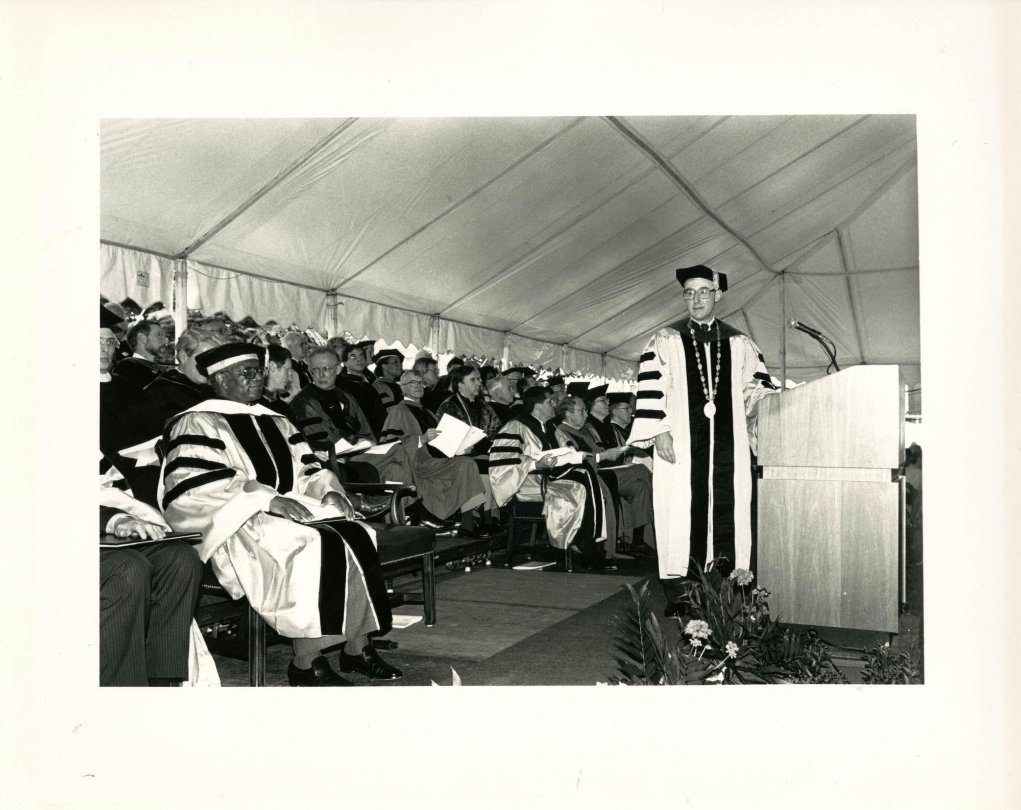 COURTESY OF THE JOHNS HOPKINS UNIVERSITY GRAPHIC AND PICTORIAL COLLECTION
Then-University President William C. Richardson speaks at Edelman's graduation in 1992.