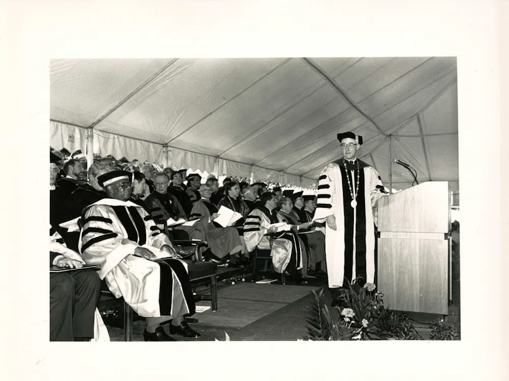 COURTESY OF THE JOHNS HOPKINS UNIVERSITY GRAPHIC AND PICTORIAL COLLECTION
Then-University President William C. Richardson speaks at Edelman's graduation in 1992.
