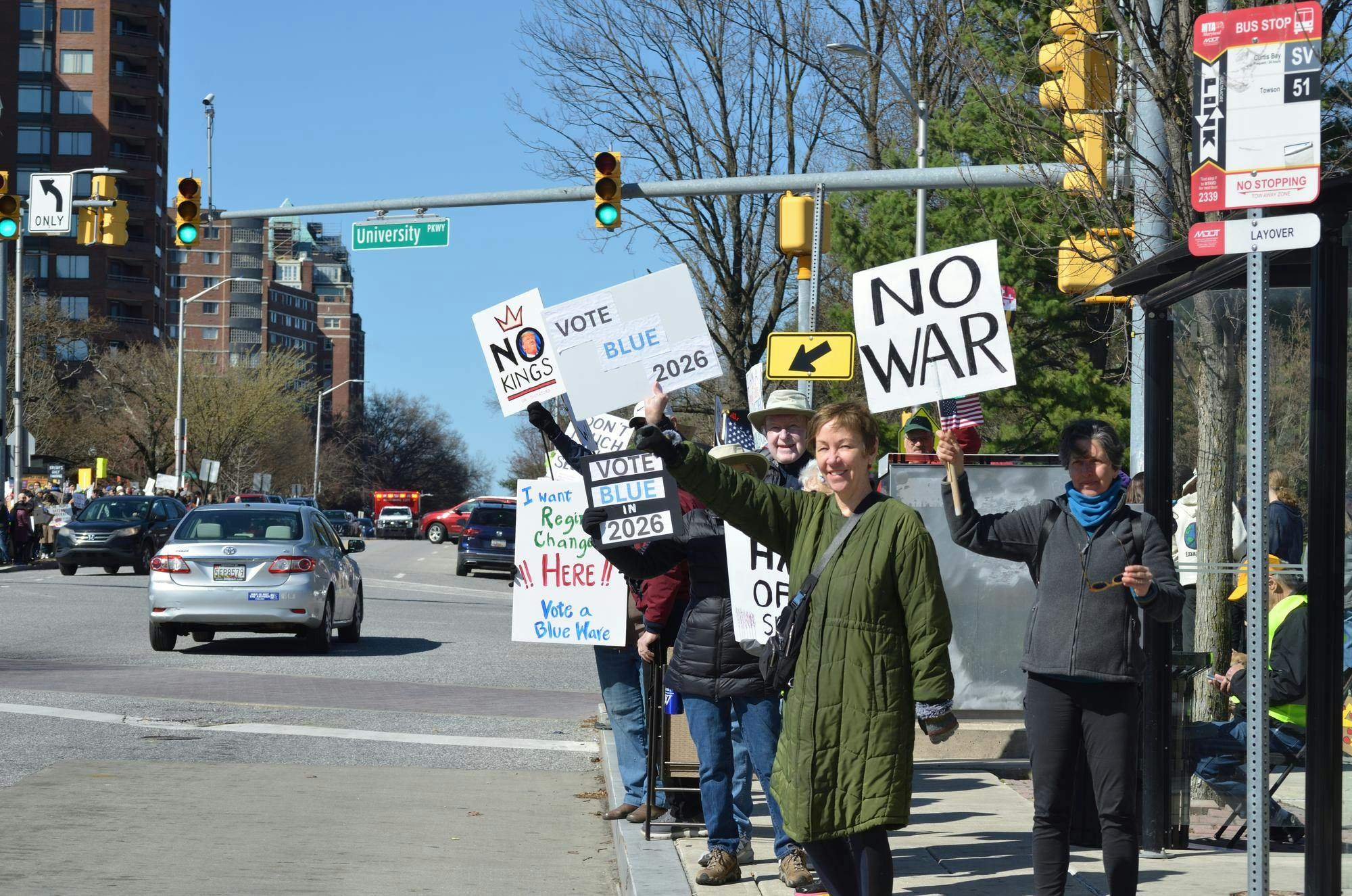 JOSHUA LONSTEIN / PHOTO EDITORHopkins students joined community members at N. Charles Street and University Parkway as part of a nationwide day of protest against the Trump Administration on Sat. March 28.