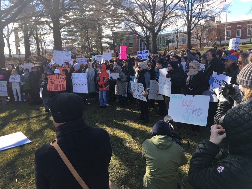 COURTESY OF ROLLIN HU
Students and faculty protested Trump’s travel ban on the Beach.
