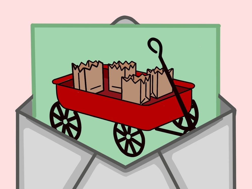 COURTESY OF SYDNOR DUFFY
Jesse Tetterton pens his legacy letter with the help of Omkar Katkade.