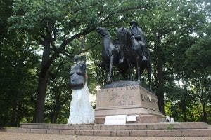  
Courtesy of MORGAN OME
Artist activists erected a statue of a pregnant black woman with her fist raised in front of a Confederate monument of General Robert E. Lee and Thomas “Stonewall” Jackson.