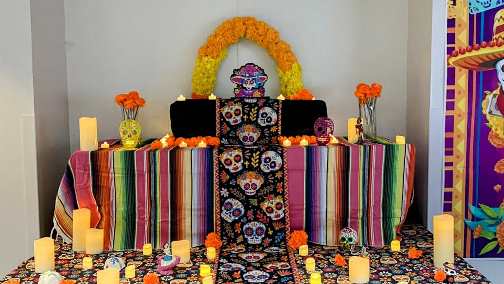 COURTESY OF NICK DAUM
Mexican, Hispanic and non-Hispanic students come together to celebrate the Mexican holiday, Día de los Muertos and contribute to the second annual community Ofrenda.