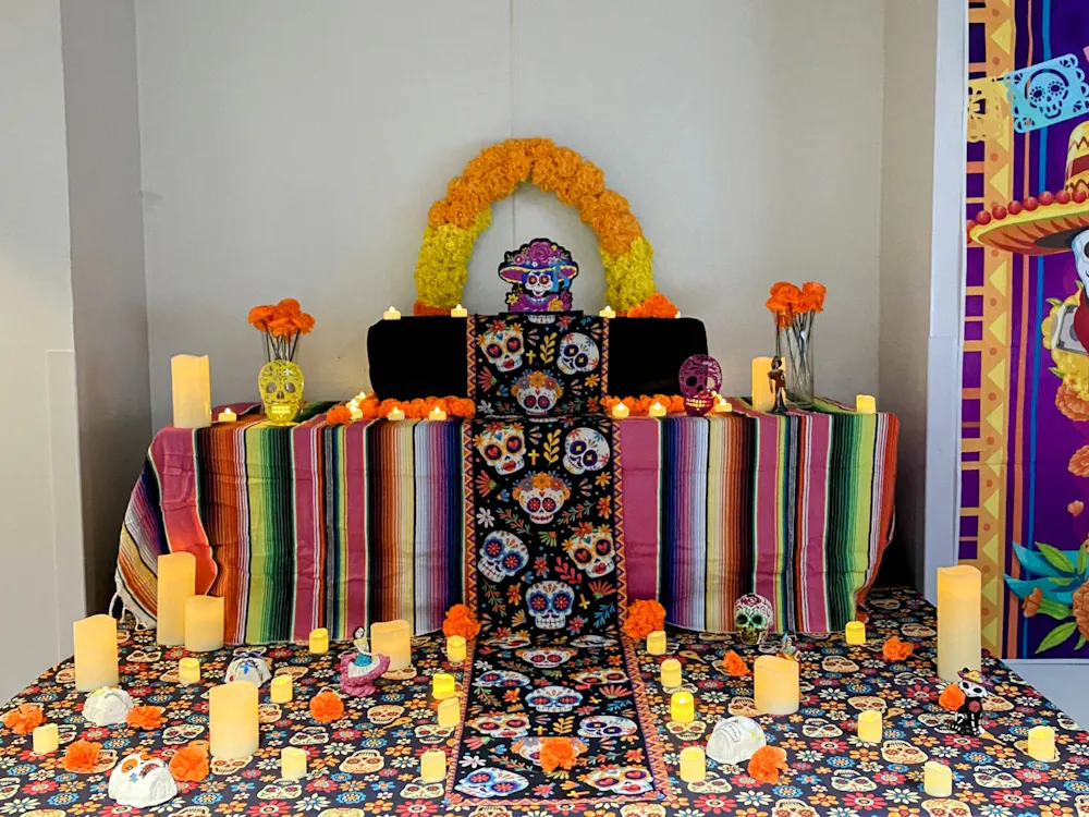 COURTESY OF NICK DAUM
Mexican, Hispanic and non-Hispanic students come together to celebrate the Mexican holiday, Día de los Muertos and contribute to the second annual community Ofrenda.
