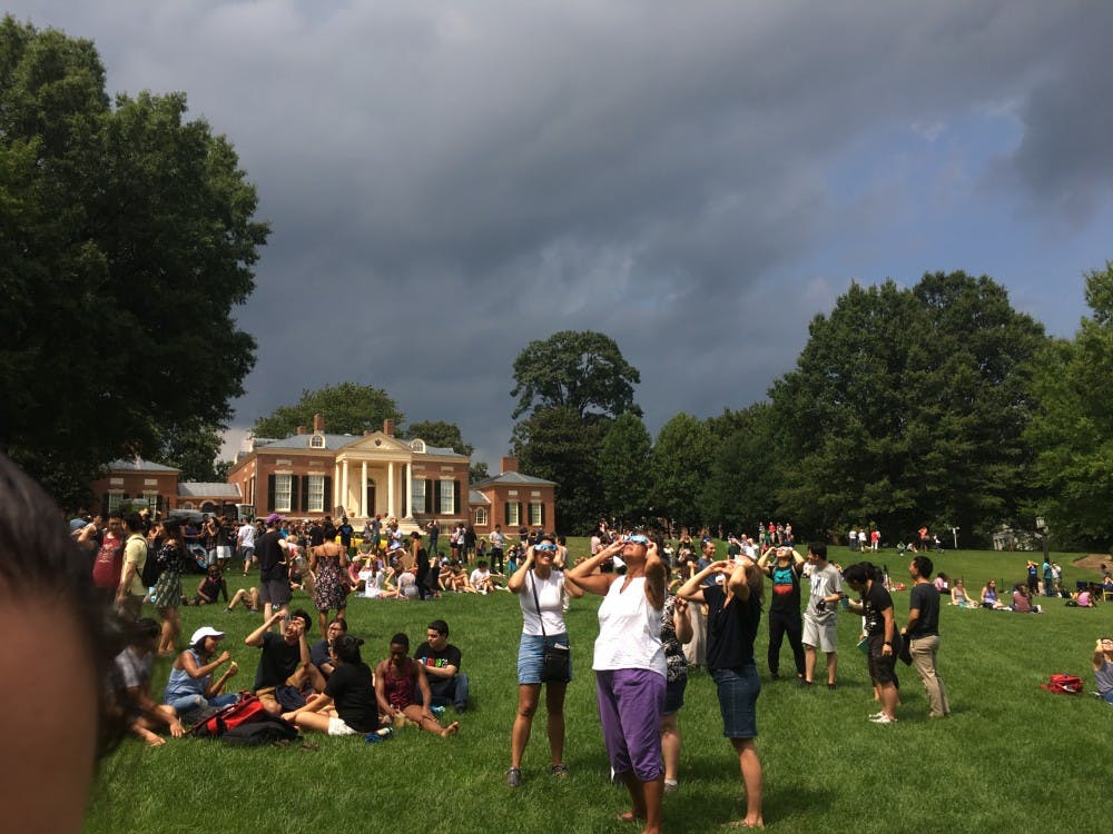 Courtesy of ROLLIN HU
Students, staff and families gathered on the Beach to watch the Aug. 21 partial solar eclipse.