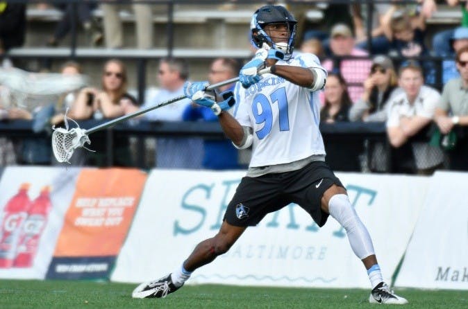 HOPKINSSPORTS.COM
Senior Nick Fields and the Hopkins defense allowed only three goals.