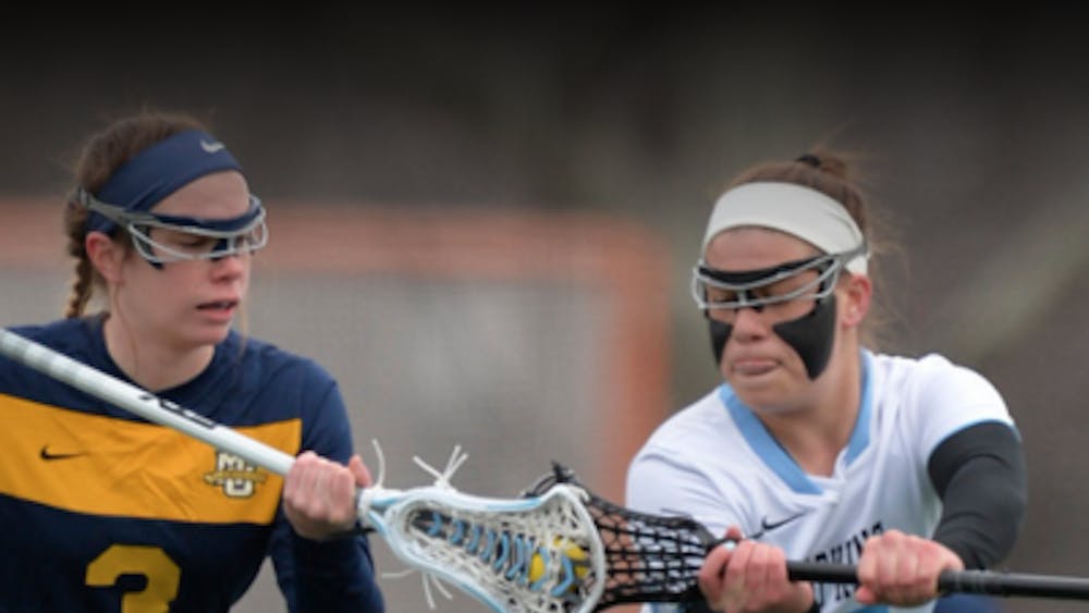 Hopkinssports.com
The Lady Jays continute to battle for every possession including the beginning with the draw.