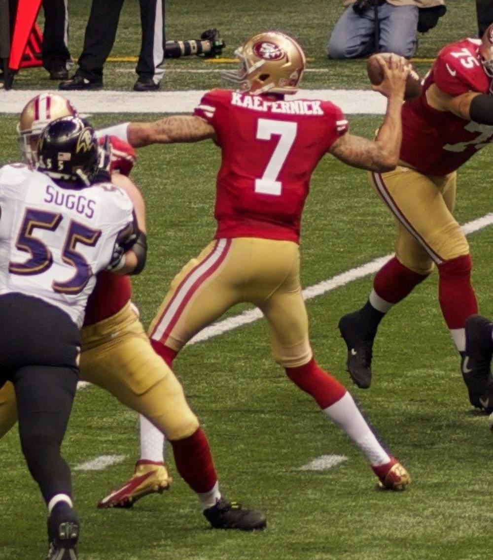 Colin_Kaepernick_in_Super_Bowl_XLVII_(cropped)