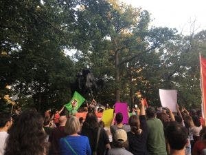  Courtesy of ROLLIN HU
Demonstrators called for the removal of the Confederate monument in Wyman Park Dell.