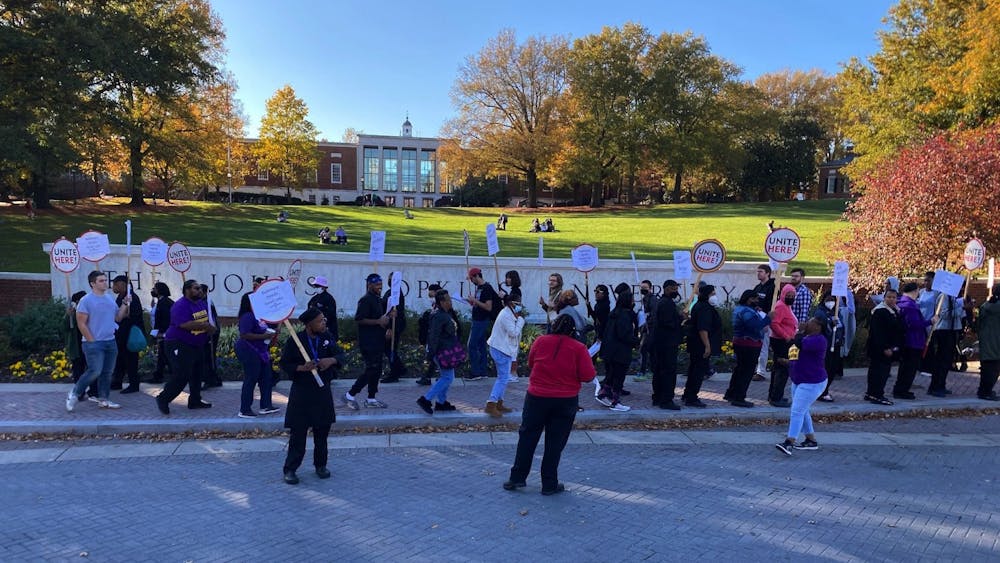 COURTESY OF LONDON CRADDOCK
Hopkins Dining employees are negotiating with the University for job security, fair wages and insurance.