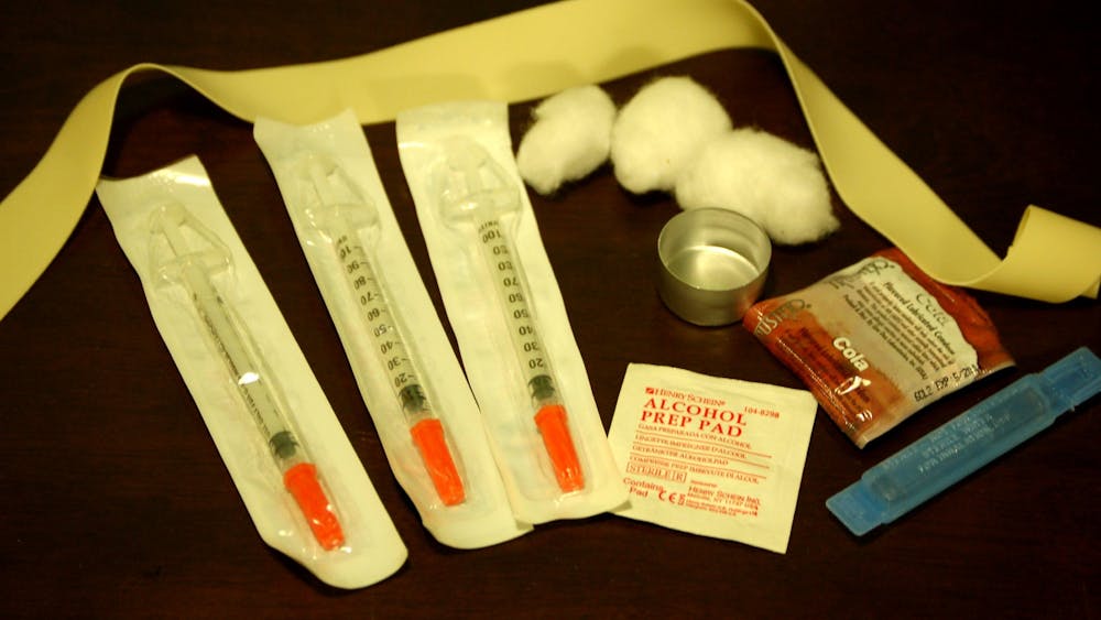 TODD HUFFMAN / CC By 2.0
People who inject drugs receive clean needles at safe injection facilities.