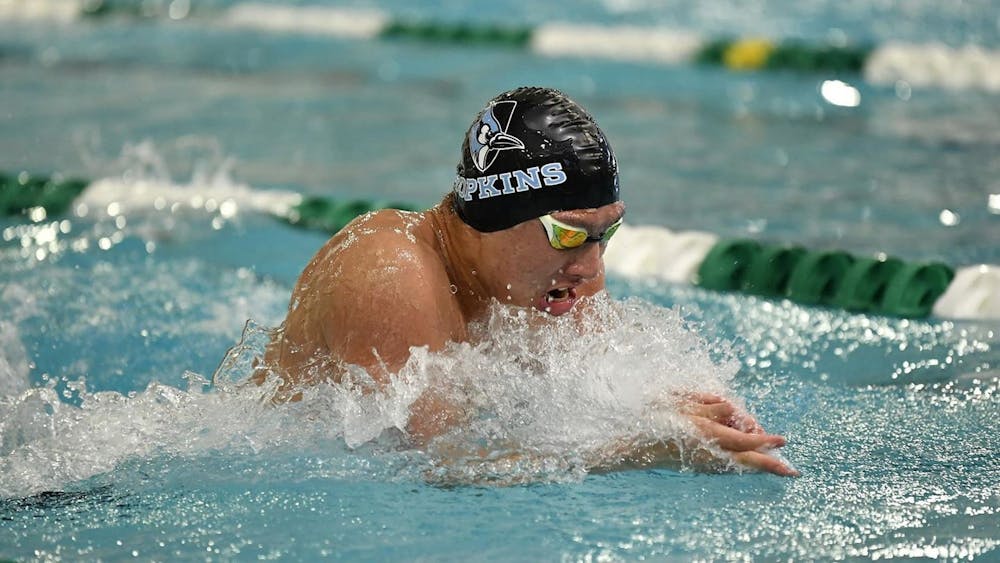 HOPKINSSPORTS.COM
Men’s and women’s swimming had several victories over the weekend, breaking new records.