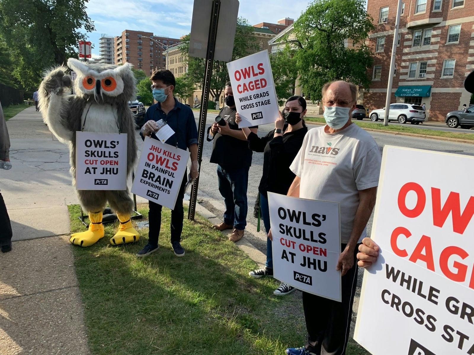 COURTESY OF TASGOLA BRUN
PETA protesters, including an owl mascot, lined the entrance to the University’s commencement celebration on Thursday evening.