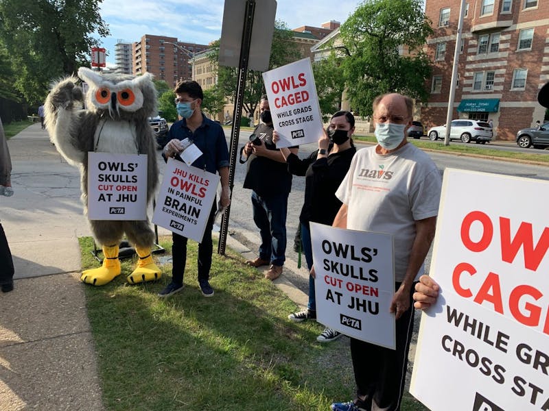 PETA protests Hopkins owl lab at commencement The Johns Hopkins NewsLetter