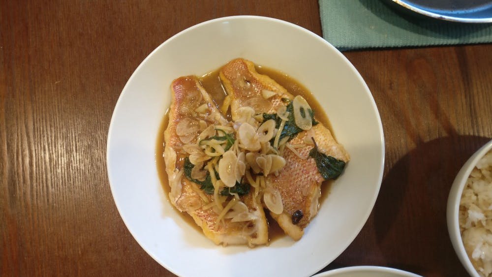 COURTESY OF JESSE WU
Pan cooked fish with garlic, ginger and Chinese shiso, a family fave.