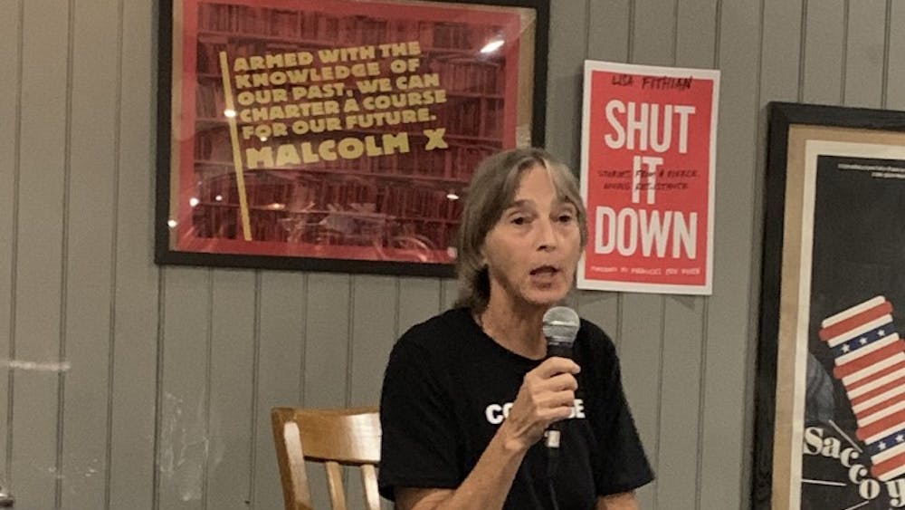 COURTESY OF JOHN ALLEN
Author Lisa Fithian visited Red Emma’s on Friday evening to present and discuss her new book Shut It Down.