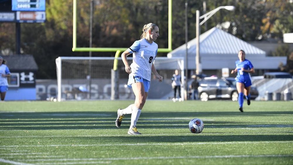 HOPKINSSPORTS.COM
Senior Maddy Rocks totaled one goal and one assist in strong showing.