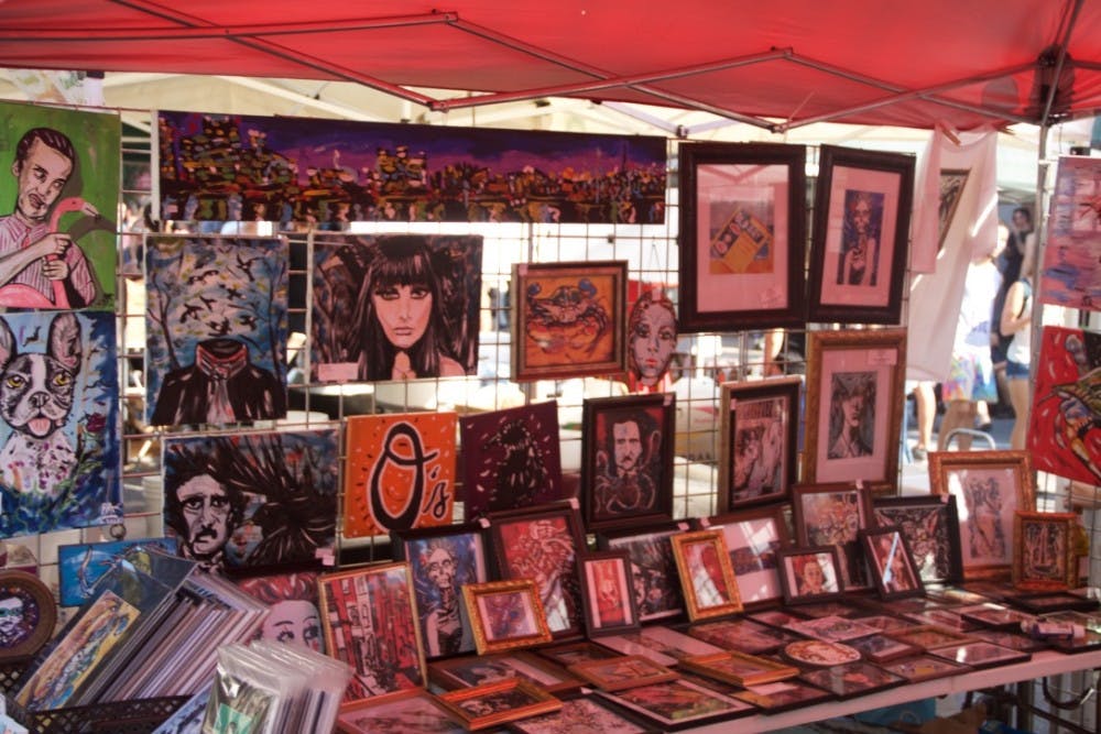 LEON SANTHAKUMAR/PHOTOGRAPHY EDITOR
Held on W. 36th Street each year, Hampdenfest hosts a diverse selection of food and art vendors.