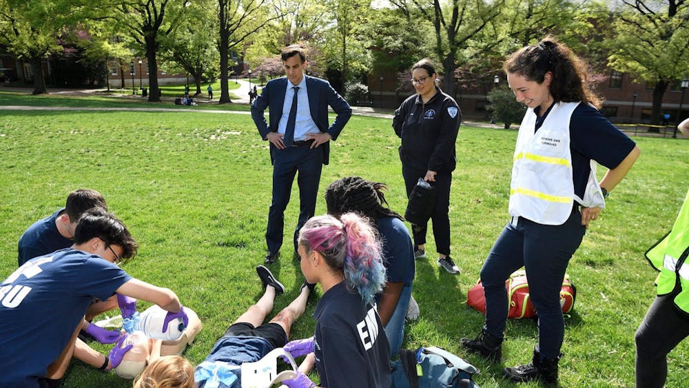 COURTESY OF HOPKINS EMERGENCY RESPONSE ORGANIZATION
HERO EMTs demonstrated their mass casualty incident drills to University President Ronald J. Daniels in spring 2019.