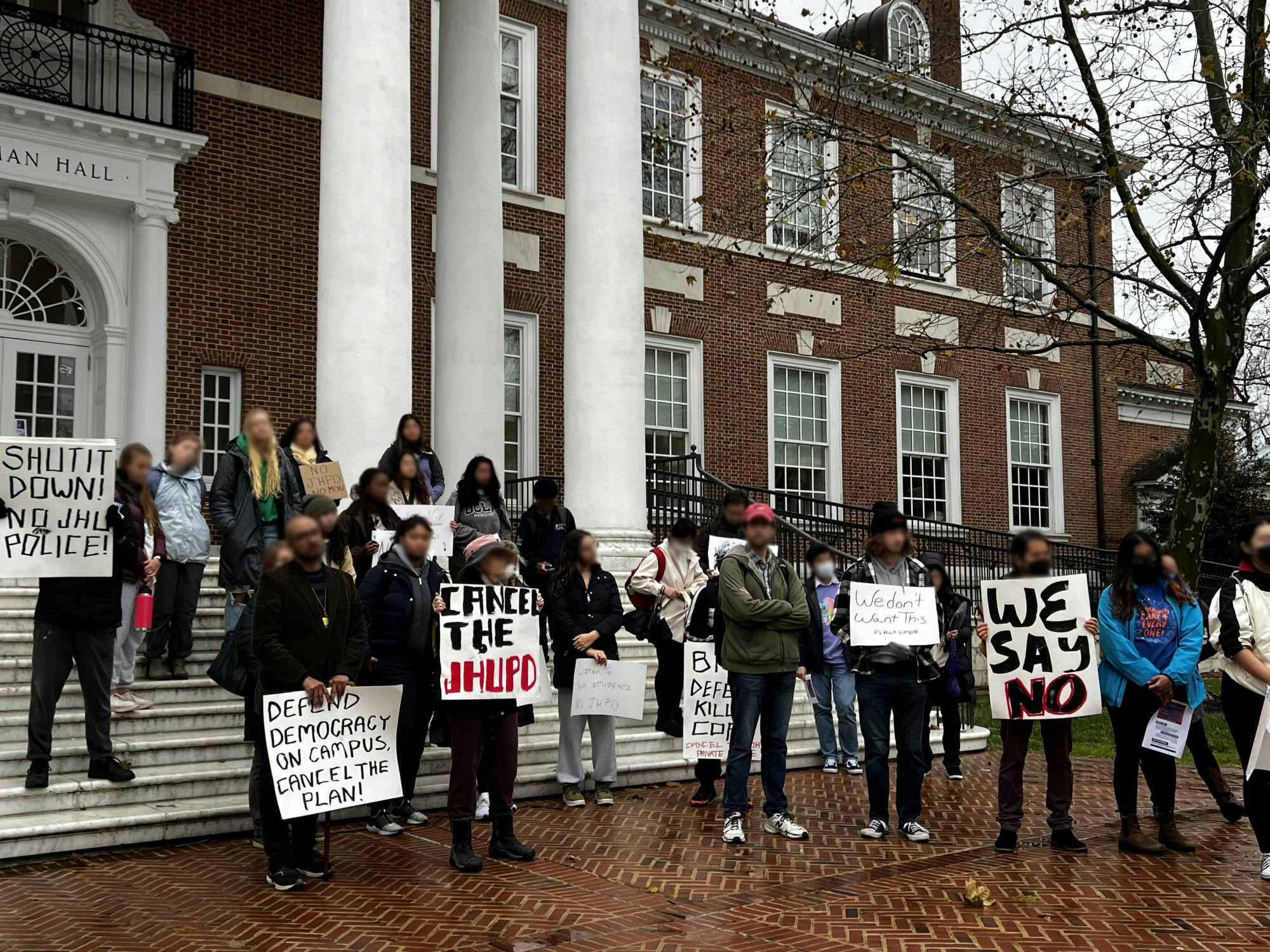 COURTESY OF AASHI MENDPARA
Community members gathered in front of Gilman Hall to oppose the signing of the Memorandum of Understanding.