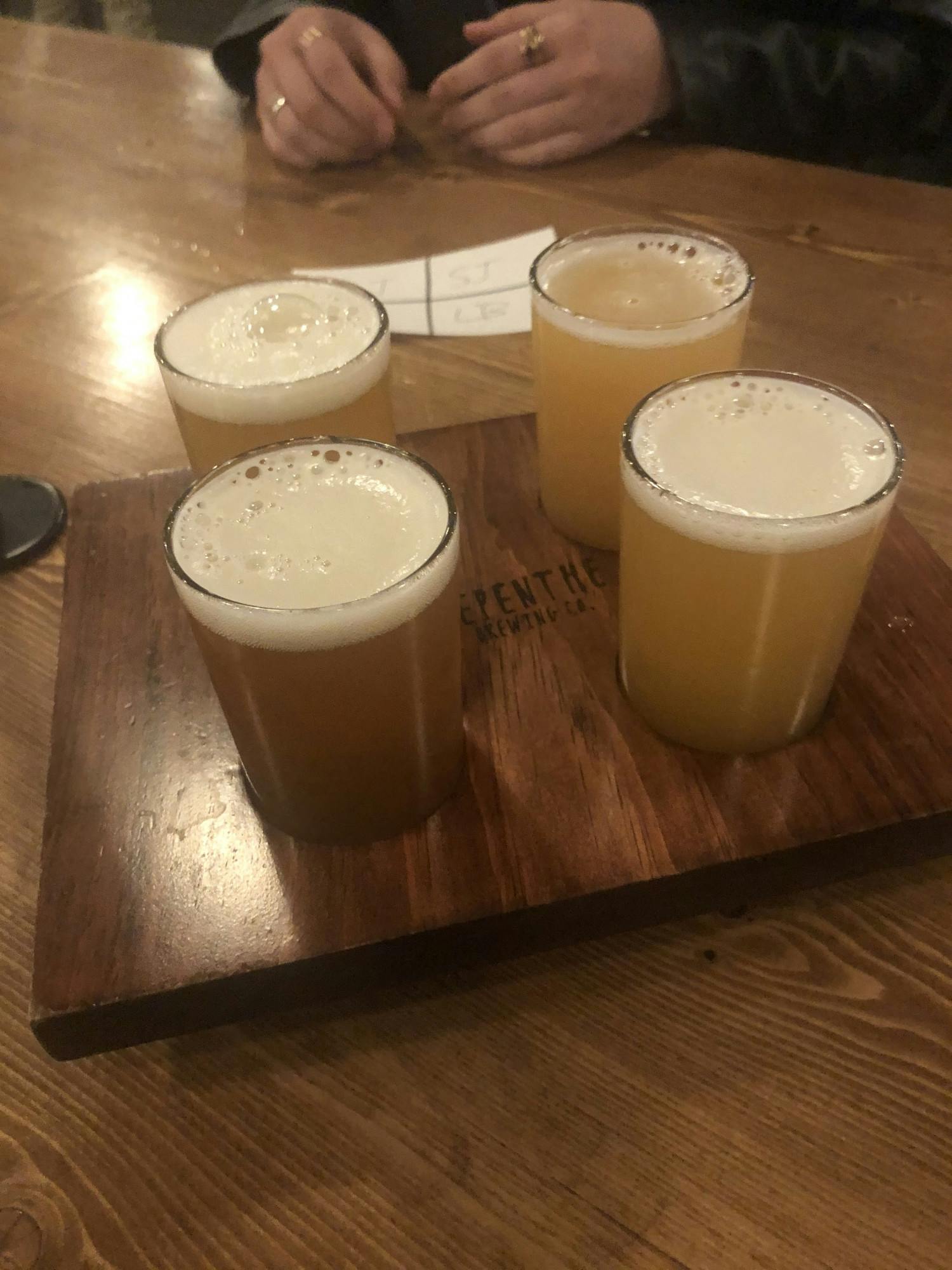 COURTESY OF SABRINA ABRAMS

Nepenthe offers flights, giving patrons the chance to sample four different beers.
