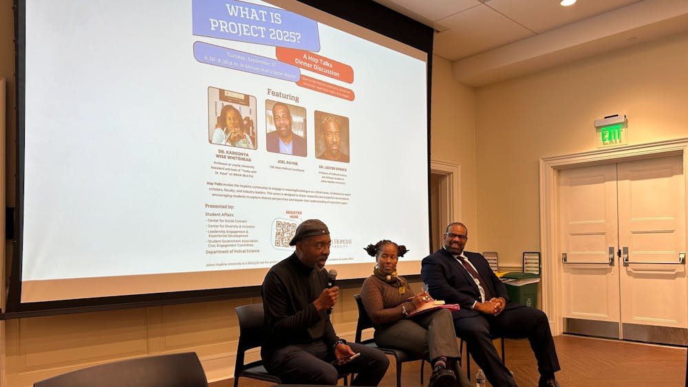 COURTESY OF RILEY STRAIT
In a dinner discussion hosted by the CSC, students, faculty and others unpack the meaning of “Project 2025”.