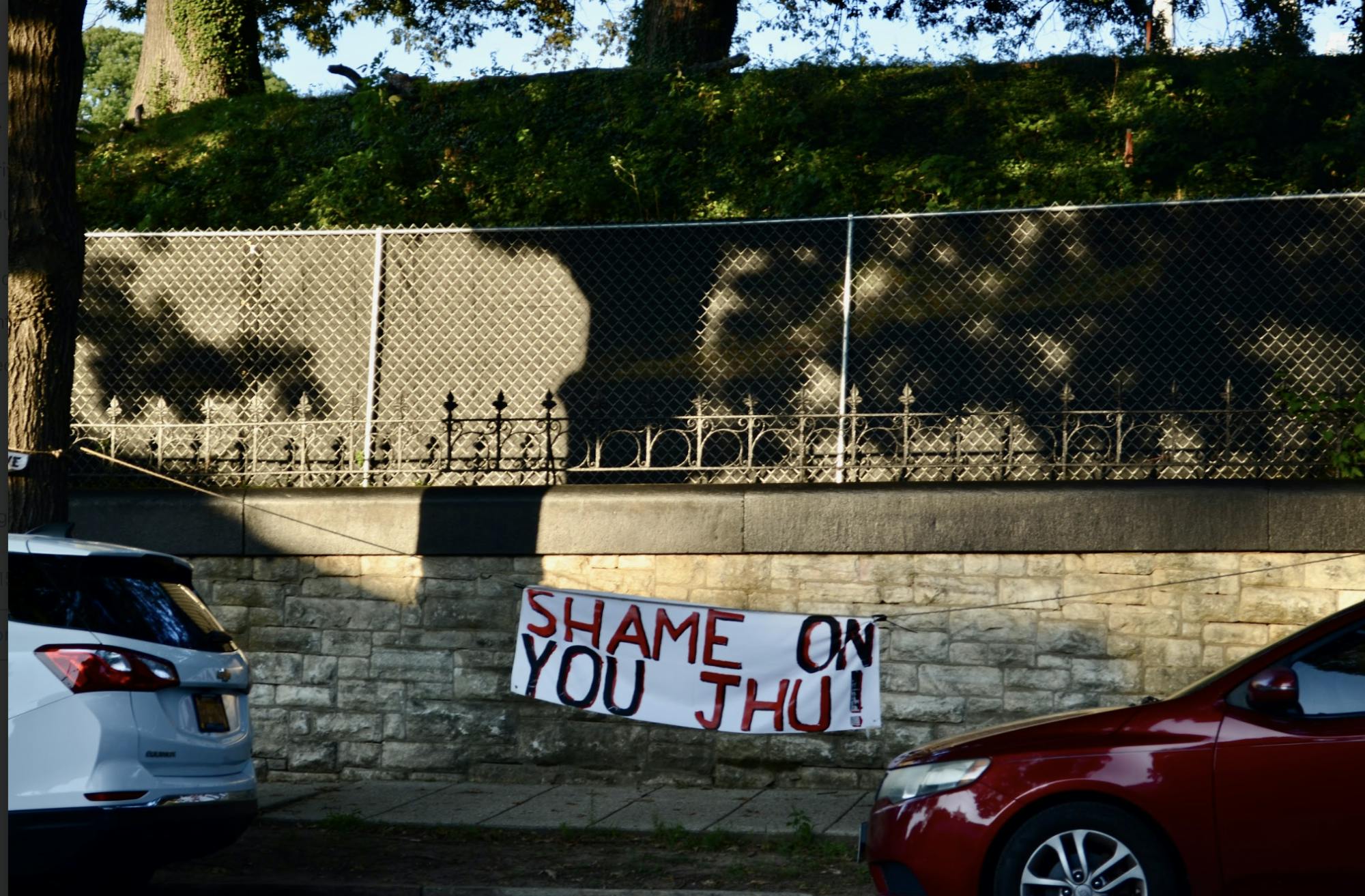 JOSHUA LONSTEIN / &nbsp;PHOTO EDITOR
Students and community members condemn University construction of the Data Science and Artificial Intelligence Institute in Wyman Park.