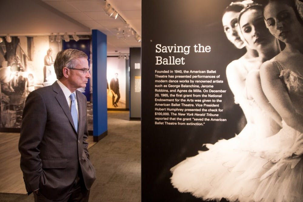  Public Domain
NEH Chairman William Adams looks at exhibits in the LBJ Library.