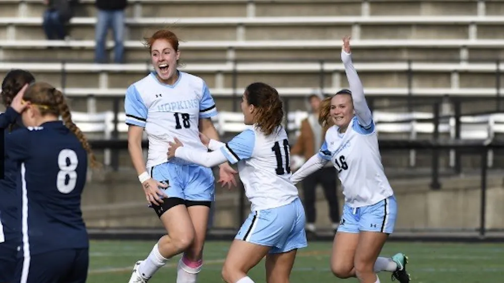 HOPKINSSPORTS.COM
Junior Kyla Persky headed the ball into the net for the second goal of her collegiate career.