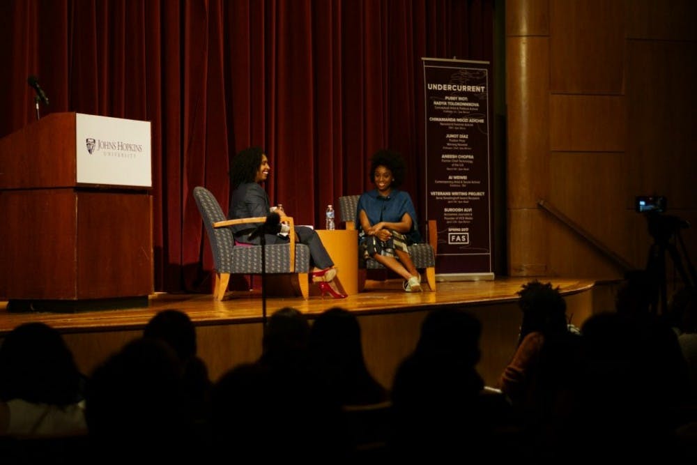  COURTESY OF KUNIL MAITI
Hopkins MFA graduate Chimamanda Ngozi Adichie (right) spoke out against the institutionalization of dehumanizing language in the United States.